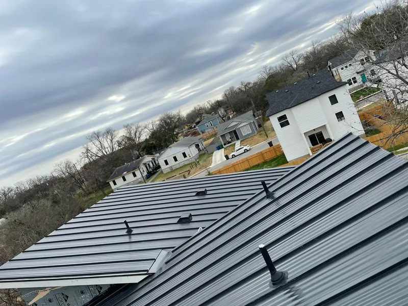 Standing seam metal roof panels with vents for Skylight Repair in Falls